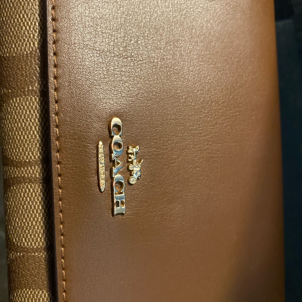 New coach wallet